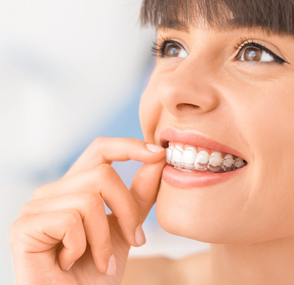 Young woman with a beautiful smile and white teeth