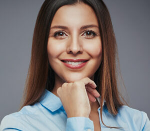 Confident businesswoman smiling with balanced gumline