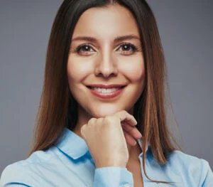 Confident businesswoman smiling with balanced gumline