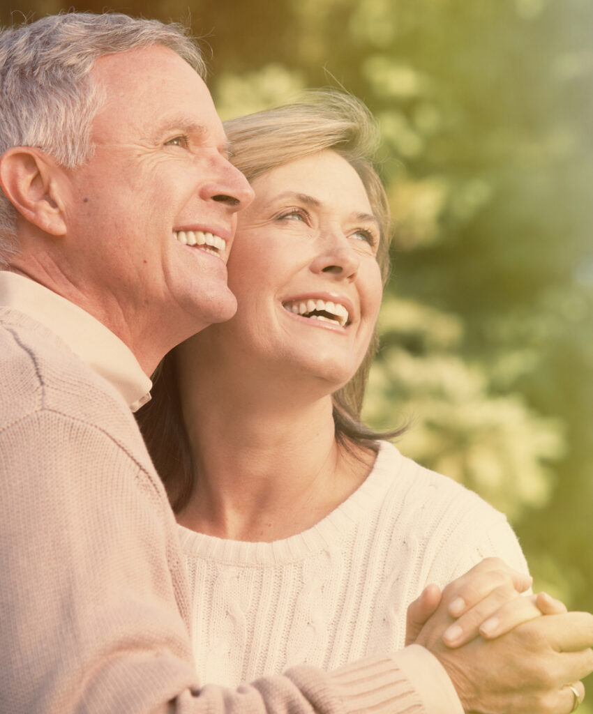 Happy senior couple smiling after dental treatment