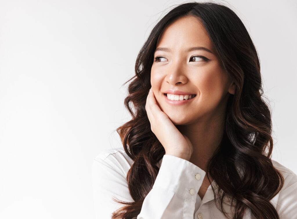 Smiling woman showcasing her bright, beautiful smile