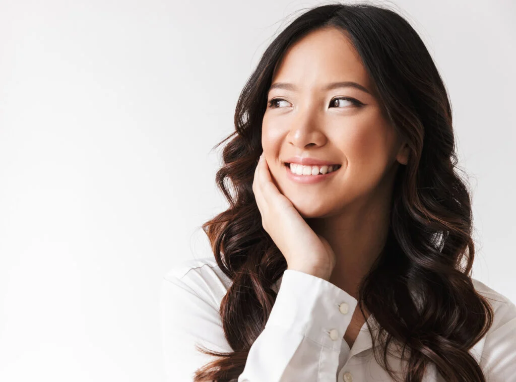 Smiling woman showcasing her bright, beautiful smile
